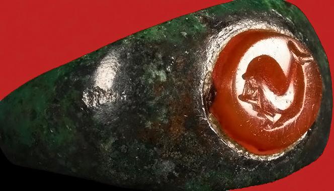 An Absolutely Beautiful Original 2nd Century Imperial Roman Officer or Noble's Carved Intaglio, Carnelian Gem Stone, Status Seal Ring, Depicting a Dolphin. Originally Worn in the Roman Empire's of Trajan to Commodus
