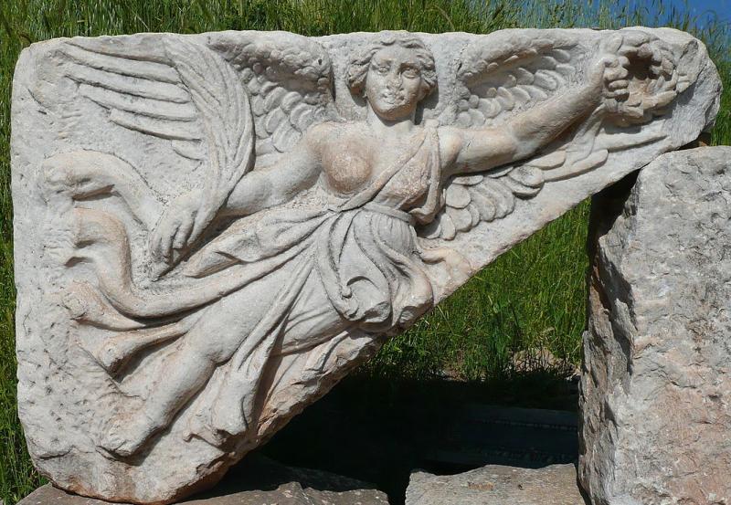 An Original, Rare Incredible & Historical Piece. Silver Imperial Roman Centurion or Tribune's Military Ring of Victory, 2nd Century AD Engraved with the Intaglio of Winged Victory, wearing her helmet and holding the laurel wreath of Victory