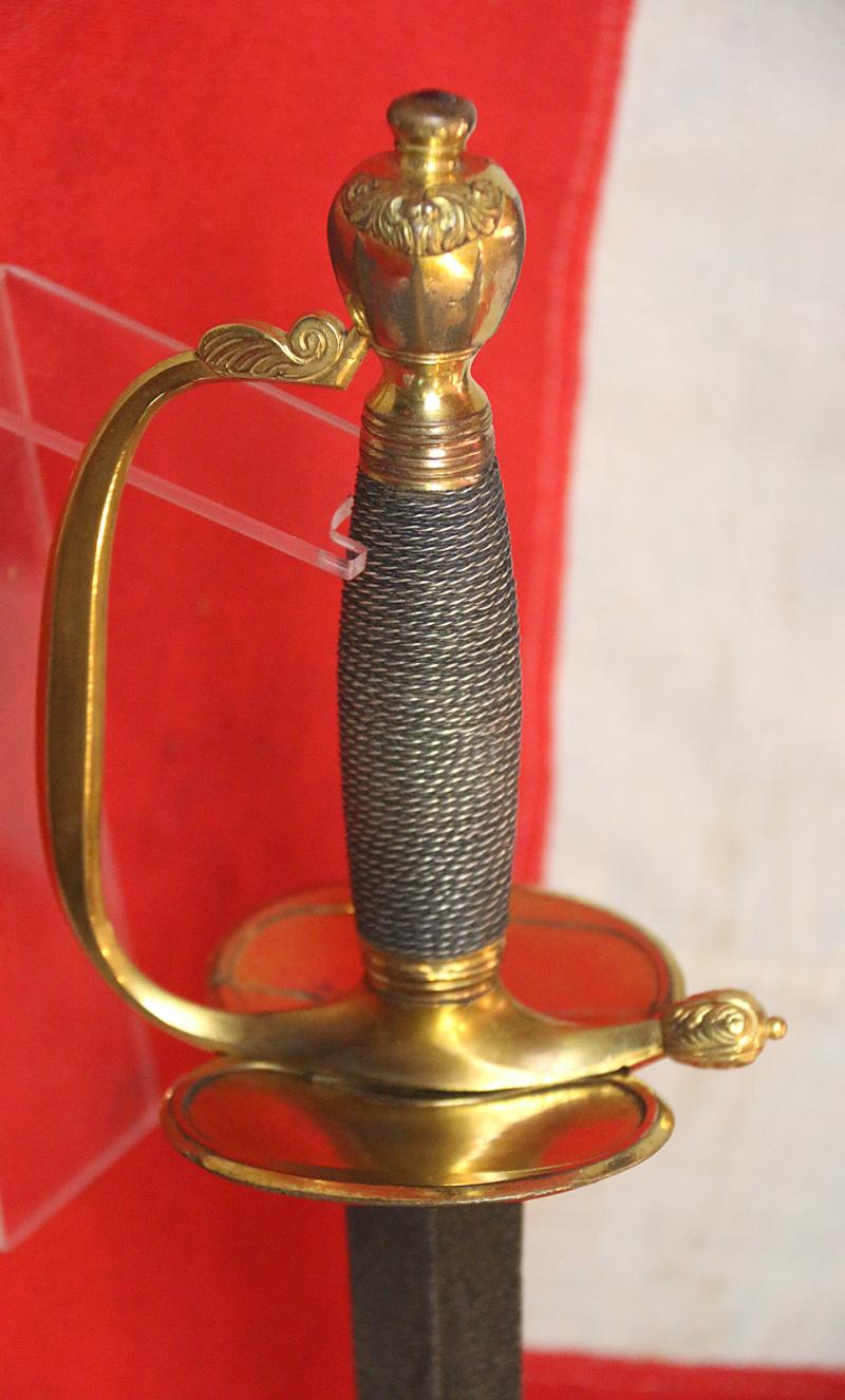 A Simply Stunning Most Rare Napoleonic Wars Type of a 1796 Infantry Officer's Sword, Monogrammed With Its Owner's Title and Monogram, Plus His Patriotic Motto “The Love Of, My Country, & Freedom” Etched Upon The Acutely Tapering “Needle Point’ Blade.