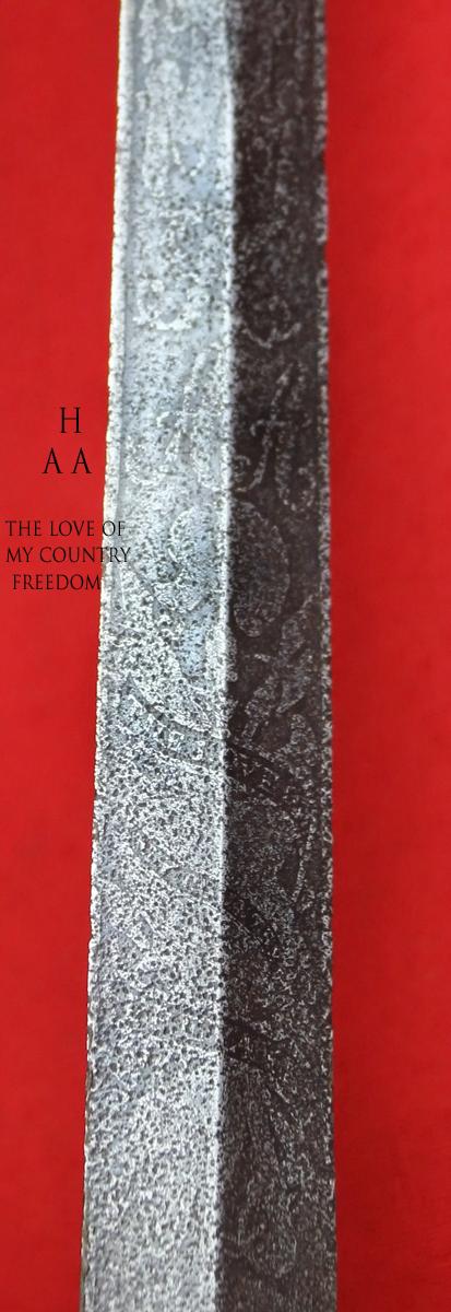 A Simply Stunning Most Rare Napoleonic Wars Type of a 1796 Infantry Officer's Sword, Monogrammed With Its Owner's Title and Monogram, Plus His Patriotic Motto “The Love Of, My Country, & Freedom” Etched Upon The Acutely Tapering “Needle Point’ Blade.