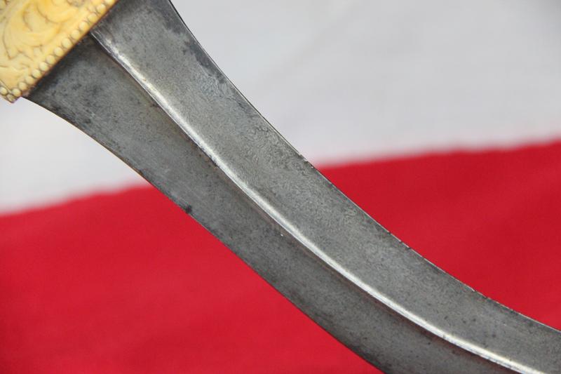 A Beautiful Indo Persian 'Tiger's Claw' Khanjar Walrus Sea Ivory and Wootz Watered Steel Bladed Dagger,