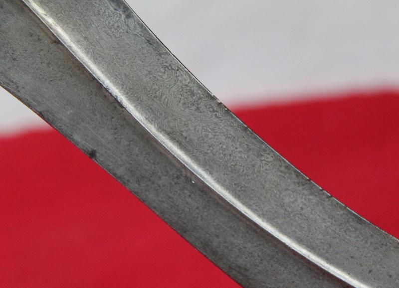 A Beautiful Indo Persian 'Tiger's Claw' Khanjar Walrus Sea Ivory and Wootz Watered Steel Bladed Dagger,