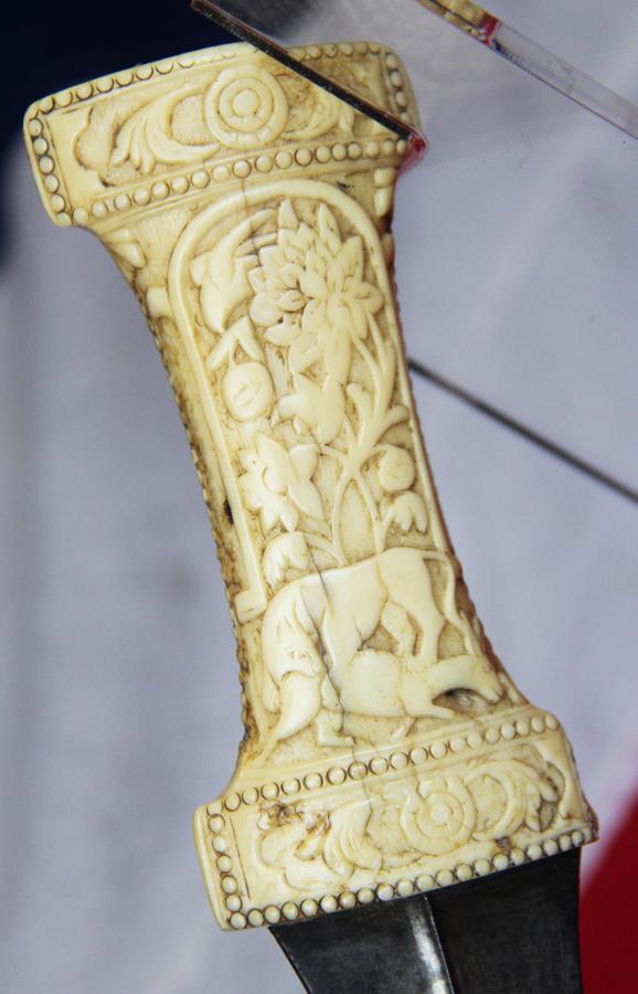 A Beautiful Indo Persian 'Tiger's Claw' Khanjar Walrus Sea Ivory and Wootz Watered Steel Bladed Dagger,