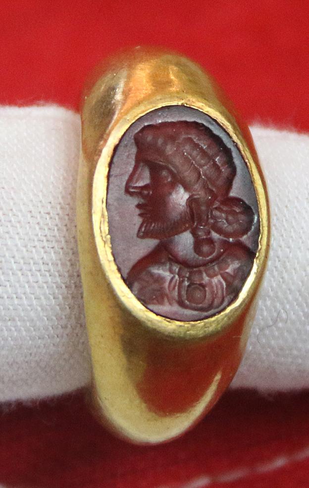 A Simply Stunning Ancient Roman Museum Grade Fine Gold Seal Ring with Intaglio Portrait Engraved Garnet Gem Stone 2nd to 3rd Century A.D. Likely a Depiction of an Emperor Such As Hadrian, Marcus Aurelius, Lucius Verus, or Even A Parthian Vassal King.