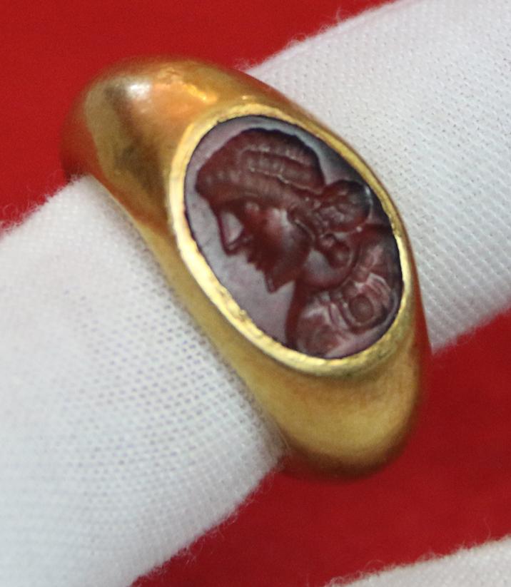 A Simply Stunning Ancient Roman Museum Grade Fine Gold Seal Ring with Intaglio Portrait Engraved Garnet Gem Stone 2nd to 3rd Century A.D. Likely a Depiction of an Emperor Such As Hadrian, Marcus Aurelius, Lucius Verus, or Even A Parthian Vassal King.