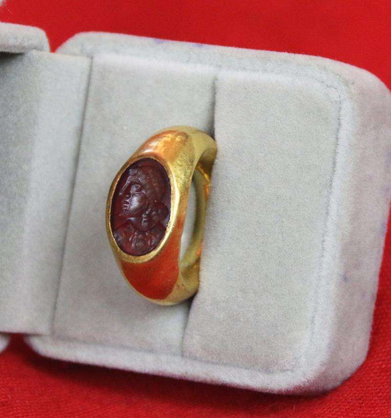 A Simply Stunning Ancient Roman Museum Grade Fine Gold Seal Ring with Intaglio Portrait Engraved Garnet Gem Stone 2nd to 3rd Century A.D. Likely a Depiction of an Emperor Such As Hadrian, Marcus Aurelius, Lucius Verus, or Even A Parthian Vassal King.