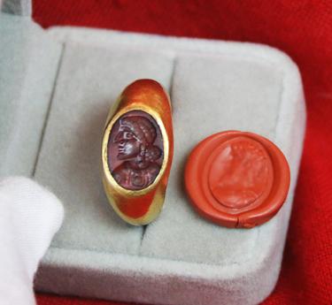 A Simply Stunning Ancient Roman Museum Grade Fine Gold Seal Ring with Intaglio Portrait Engraved Garnet Gem Stone 2nd to 3rd Century A.D. Likely a Depiction of an Emperor Such As Hadrian, Marcus Aurelius, Lucius Verus, or Even A Parthian Vassal King.