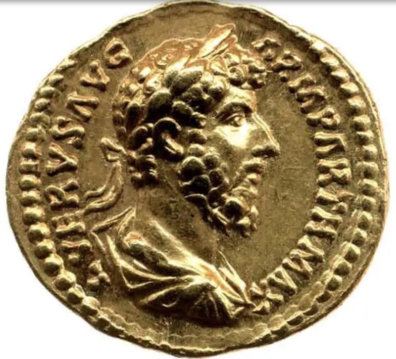 A Simply Stunning Ancient Roman Museum Grade Fine Gold Seal Ring with Intaglio Portrait Engraved Garnet Gem Stone 2nd to 3rd Century A.D. Likely a Depiction of an Emperor Such As Hadrian, Marcus Aurelius, Lucius Verus, or Even A Parthian Vassal King.