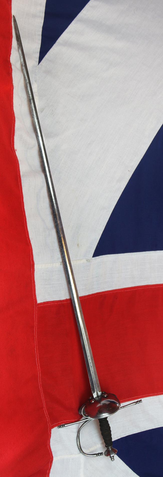 A Superb Spanish Cup Hilt Rapier Circa 1660. Double Shell Asymmetrical Hilt Guard With Long Crossguard, Octohedral Double Conical Pommel & Large Pas Dans