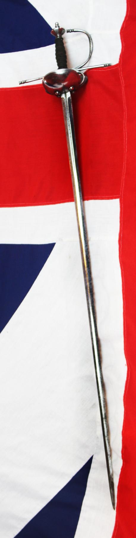 A Superb Spanish Cup Hilt Rapier Circa 1660. Double Shell Asymmetrical Hilt Guard With Long Crossguard, Octohedral Double Conical Pommel & Large Pas Dans