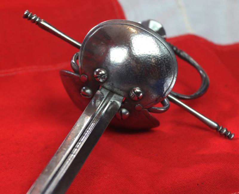 A Superb Spanish Cup Hilt Rapier Circa 1660. Double Shell Asymmetrical Hilt Guard With Long Crossguard, Octohedral Double Conical Pommel & Large Pas Dans