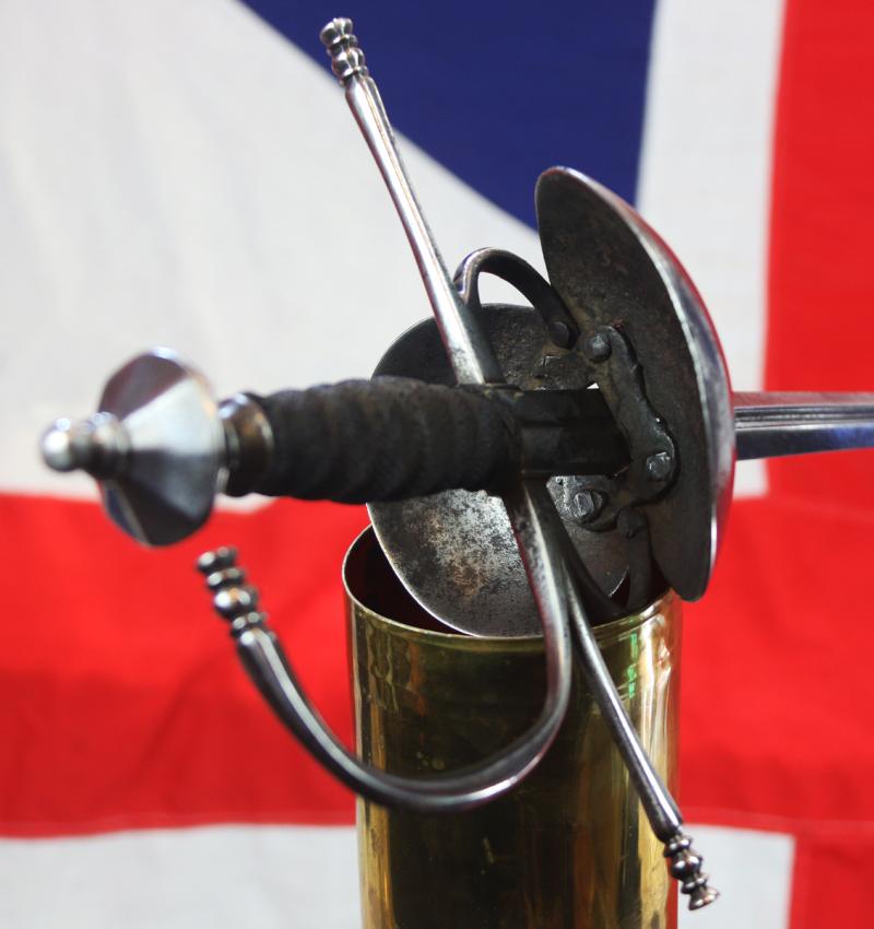 A Superb Spanish Cup Hilt Rapier Circa 1660. Double Shell Asymmetrical Hilt Guard With Long Crossguard, Octohedral Double Conical Pommel & Large Pas Dans