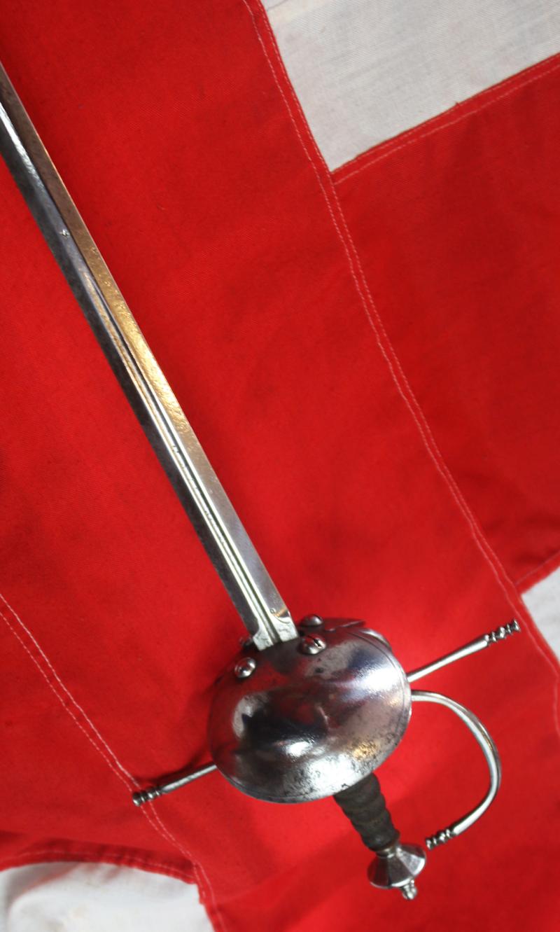 A Superb Spanish Cup Hilt Rapier Circa 1660. Double Shell Asymmetrical Hilt Guard With Long Crossguard, Octohedral Double Conical Pommel & Large Pas Dans