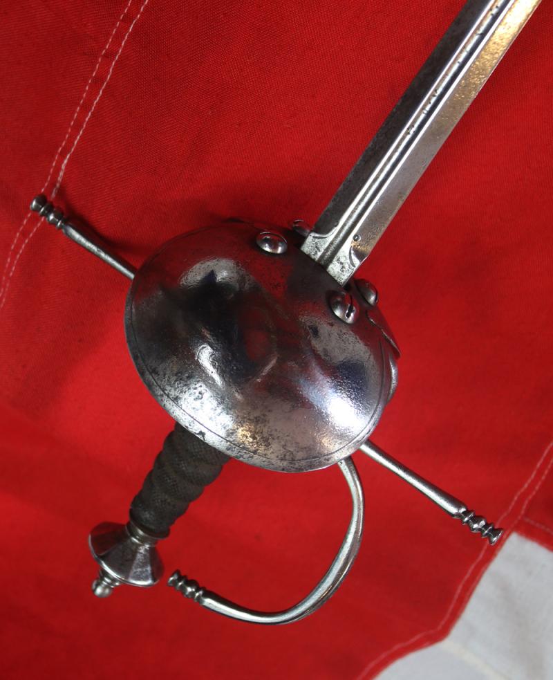 A Superb Spanish Cup Hilt Rapier Circa 1660. Double Shell Asymmetrical Hilt Guard With Long Crossguard, Octohedral Double Conical Pommel & Large Pas Dans