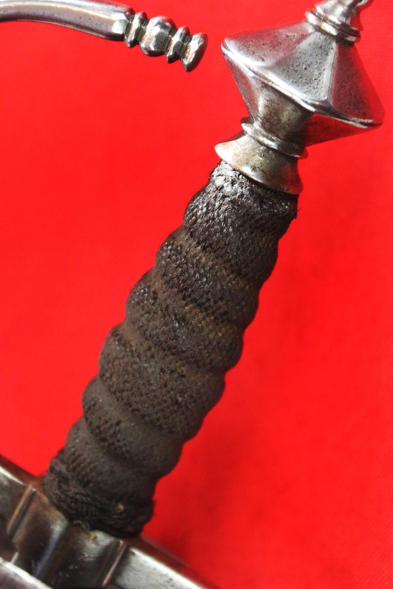 A Superb Spanish Cup Hilt Rapier Circa 1660. Double Shell Asymmetrical Hilt Guard With Long Crossguard, Octohedral Double Conical Pommel & Large Pas Dans