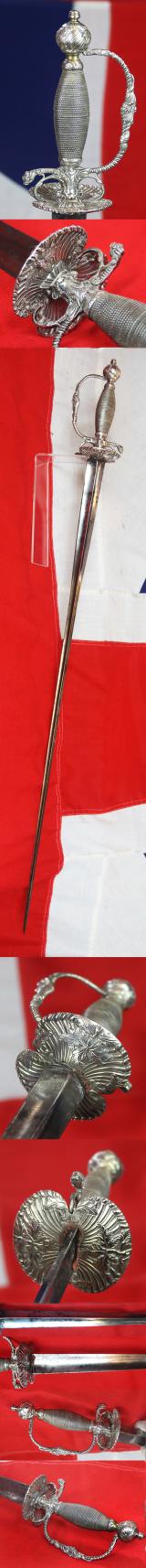 A Magnificent 18th Century Silver Hilted Small Sword, Dated 1758, with Colichmarde Blade. This Is One Of The Most Beautiful To Be Seen