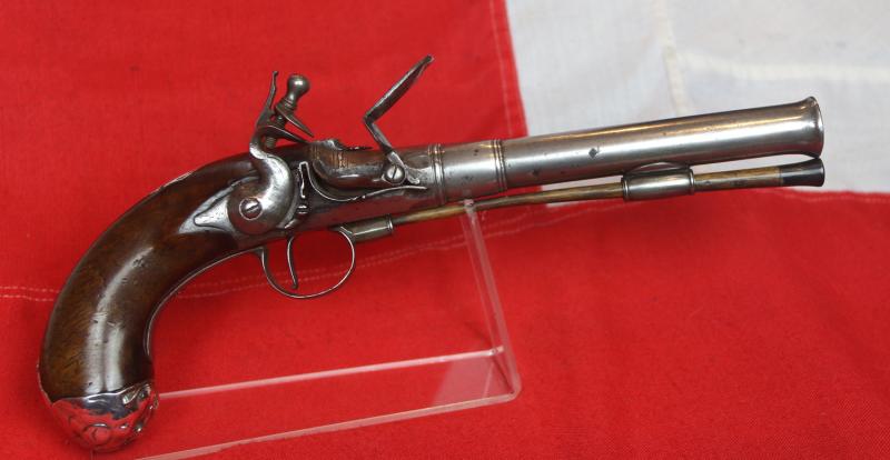 A Sublime 'Queen Anne', Circa 1720, Cannon Barrel Flintlock Holster Pistol of Sidelock Action, With Solid Silver Mounts Including a Silver, Maned Lion Head Butt Cap, and Silver Dragon Sideplate