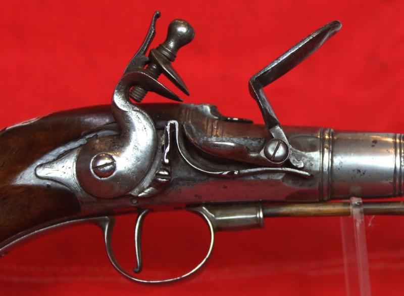 A Sublime 'Queen Anne', Circa 1720, Cannon Barrel Flintlock Holster Pistol of Sidelock Action, With Solid Silver Mounts Including a Silver, Maned Lion Head Butt Cap, and Silver Dragon Sideplate