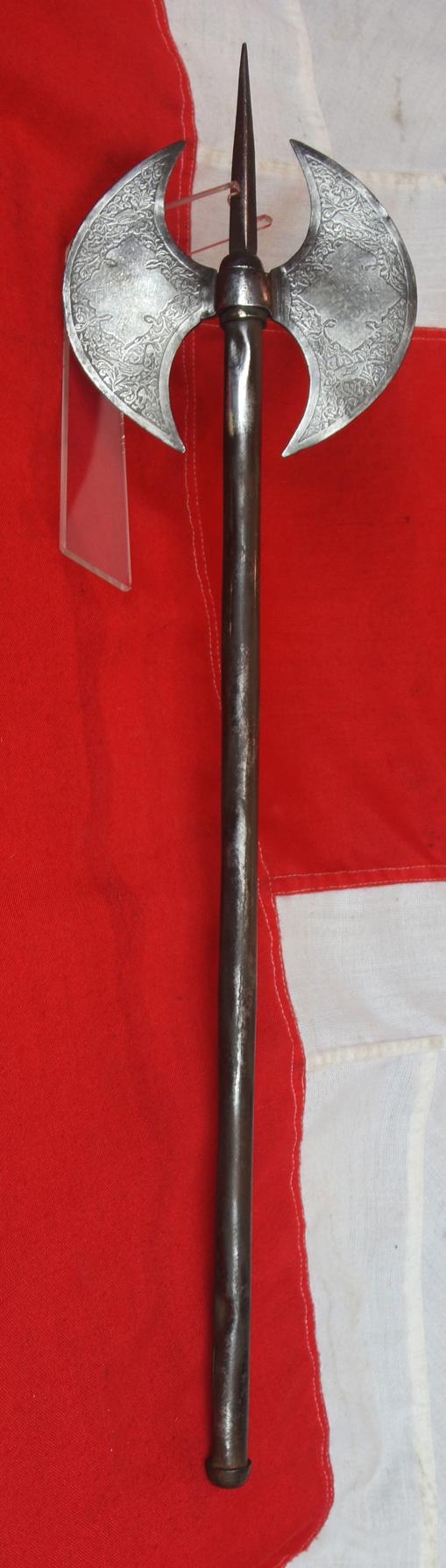 A 18th to Mid 19th Century Steel, Indo Persian, Double Crescent Blade Headed War Axe and Spike, Known as a Tabarzin