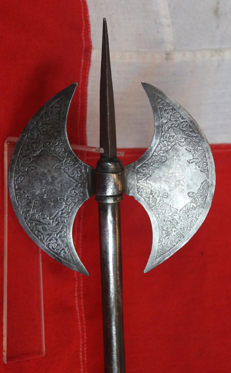 A 18th to Mid 19th Century Steel, Indo Persian, Double Crescent Blade Headed War Axe and Spike, Known as a Tabarzin