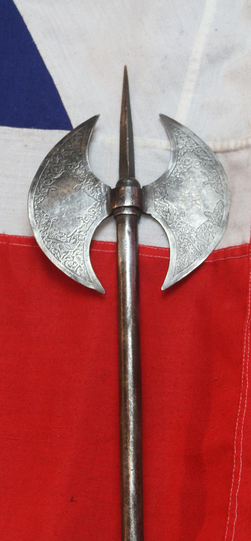 A 18th to Mid 19th Century Steel, Indo Persian, Double Crescent Blade Headed War Axe and Spike, Known as a Tabarzin