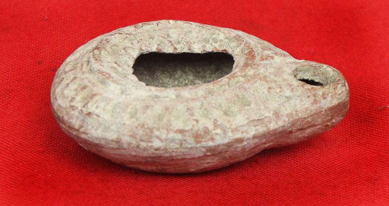 Ancient Imperial Roman Discus Form Oil Lamp with Embossed Design Circa 100 AD