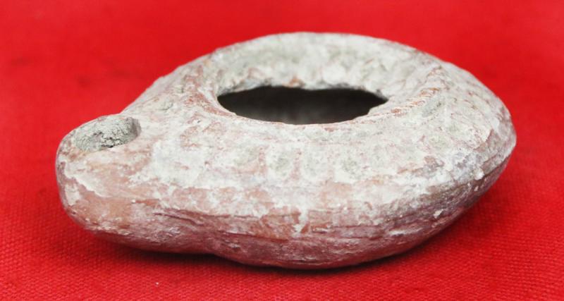 Ancient Imperial Roman Discus Form Oil Lamp with Embossed Design Circa 100 AD