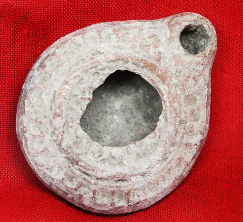 Ancient Imperial Roman Discus Form Oil Lamp with Embossed Design Circa 100 AD