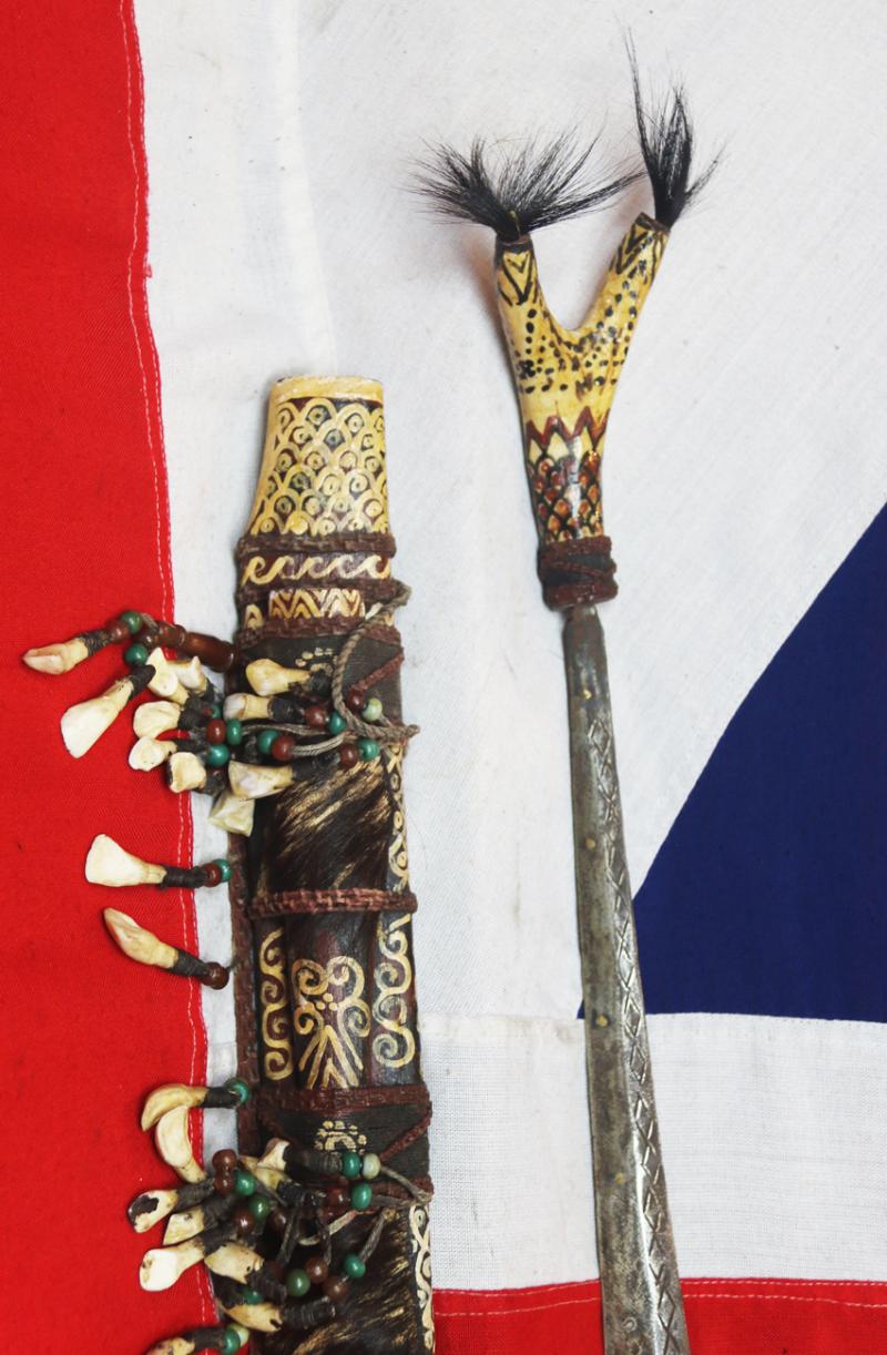 A Dyak Of Borneo, Tribesman's Mandau. A Tribal Head Hunter's Sword, From Kalimantan Island