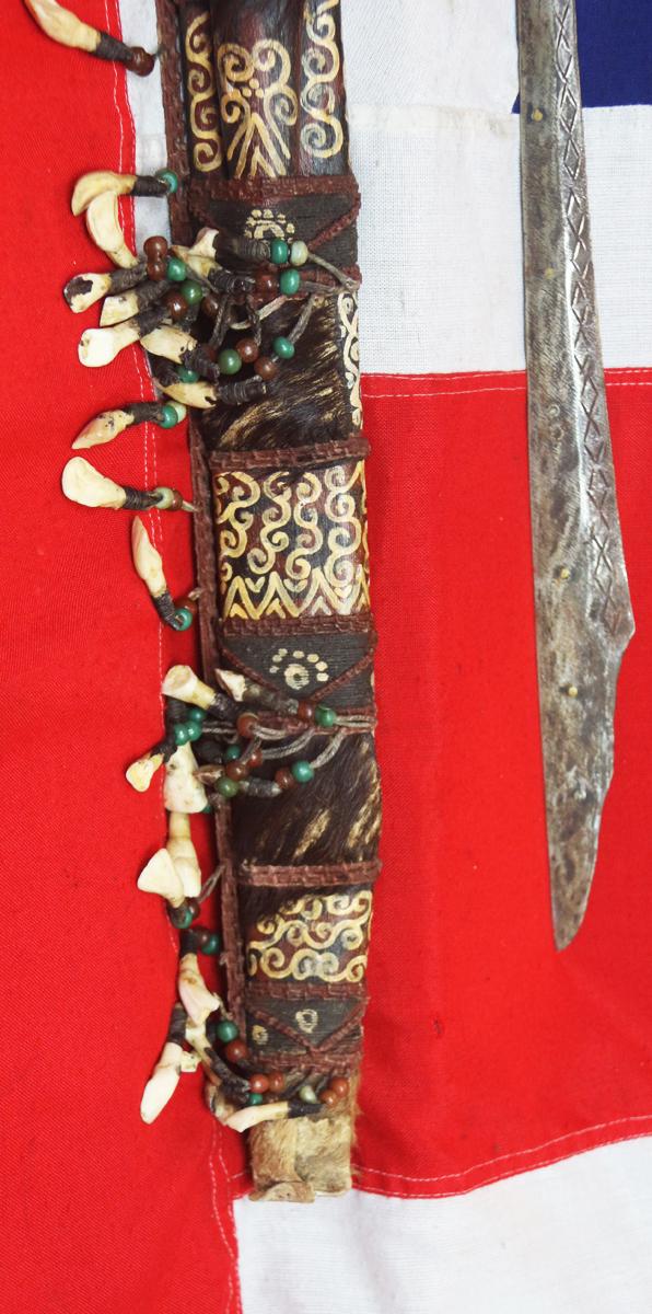 A Dyak Of Borneo, Tribesman's Mandau. A Tribal Head Hunter's Sword, From Kalimantan Island