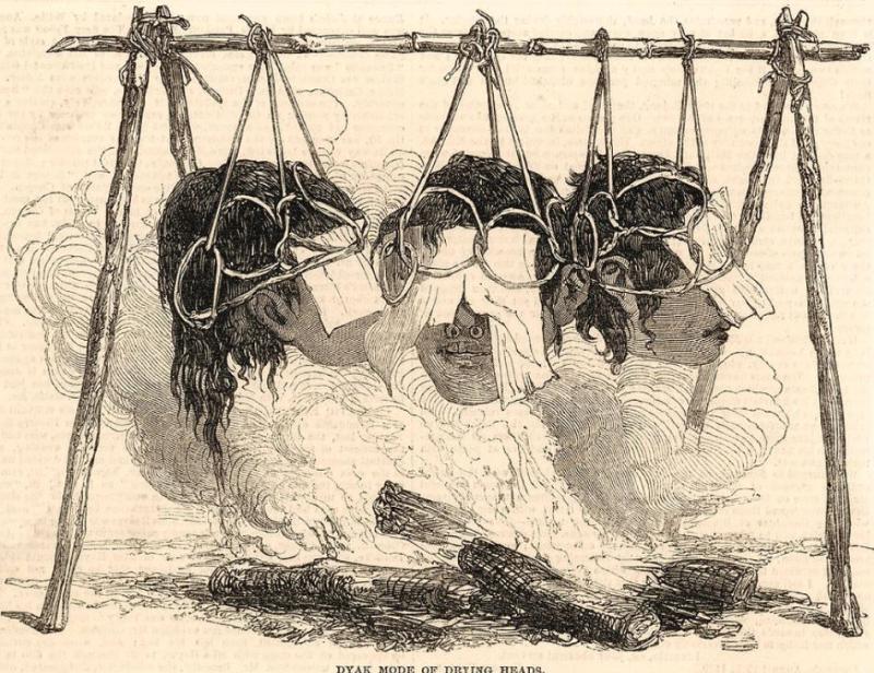 A Dyak Of Borneo, Tribesman's Mandau. A Tribal Head Hunter's Sword, From Kalimantan Island