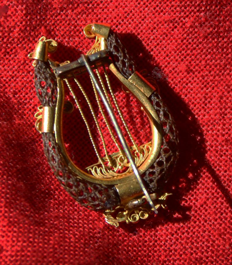 A Superb Piece of 'Potential', Unique History. Admiral Lord Nelson's Hair Woven Into a Piece of Memorium Jewellery, A Lyre Brooch of Extraordinary Quality