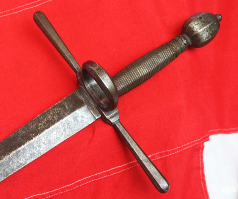 A Very Fine Antique Longsword, Likely German, 16th-17th Century Style, With Double Edged Graduating Diamond Shaped Blade, Bearing Armourers Mark, Crossguard With Single Oval Side Ring