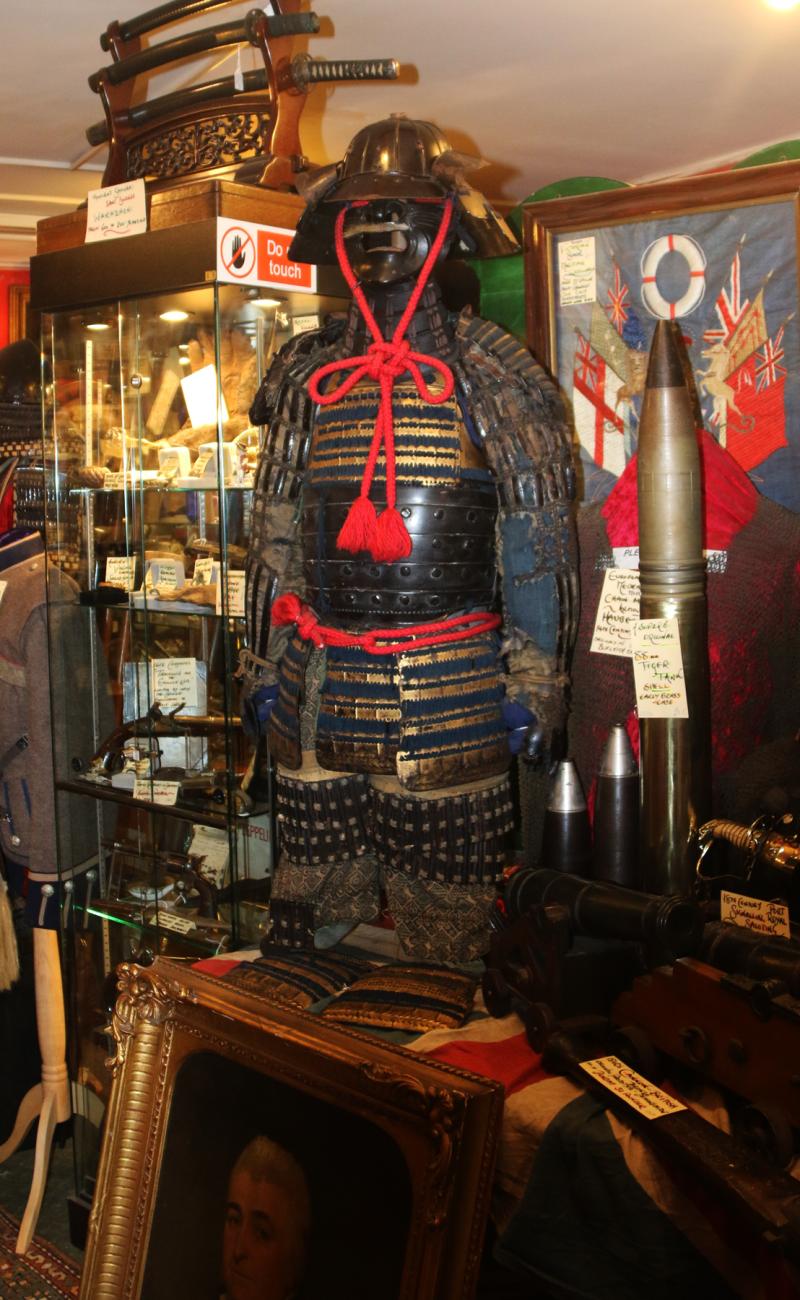 A Beautiful Suit of Edo Samurai Armour in Gold and Black Lacquer With Blue and Black Lacing, Multi Plate Helmet with Dragon Fly Fukegaeshi, With Ressai {Fierce Face} Menpo