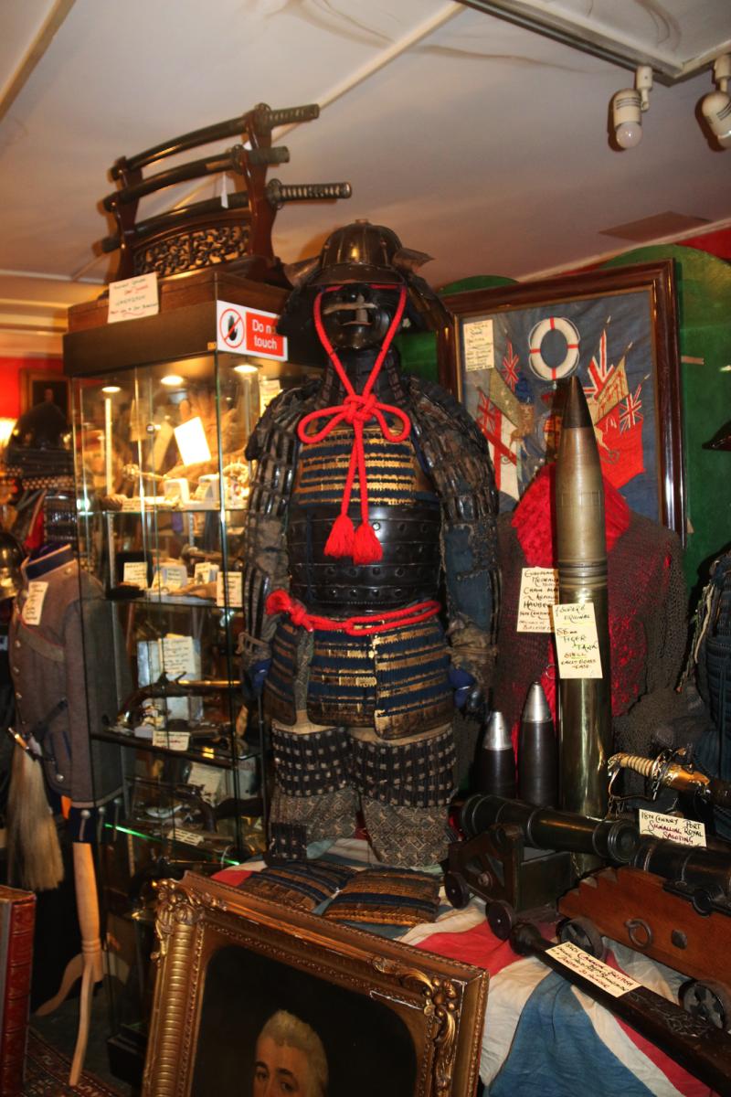 A Beautiful Suit of Edo Samurai Armour in Gold and Black Lacquer With Blue and Black Lacing, Multi Plate Helmet with Dragon Fly Fukegaeshi, With Ressai {Fierce Face} Menpo