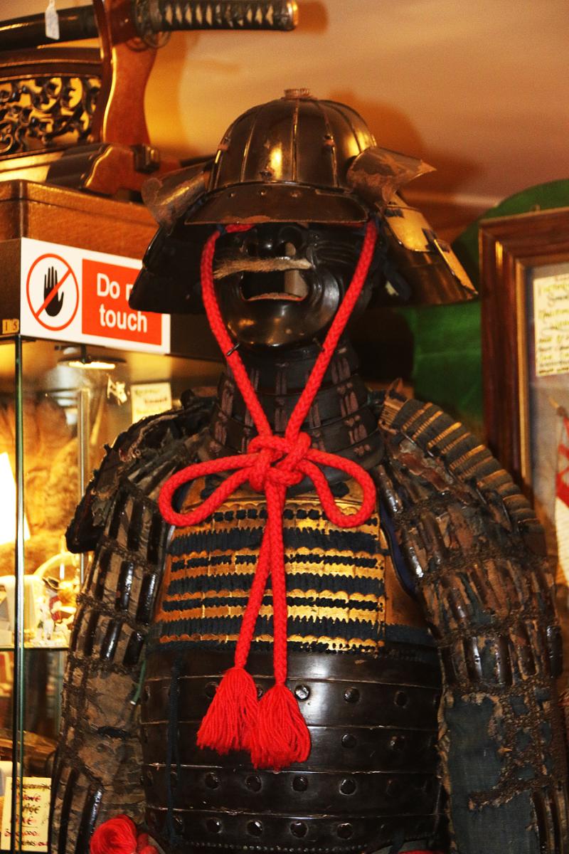 A Beautiful Suit of Edo Samurai Armour in Gold and Black Lacquer With Blue and Black Lacing, Multi Plate Helmet with Dragon Fly Fukegaeshi, With Ressai {Fierce Face} Menpo