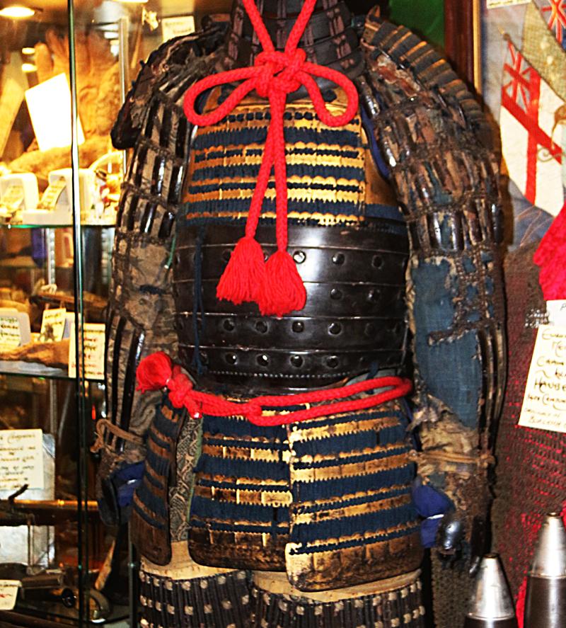 A Beautiful Suit of Edo Samurai Armour in Gold and Black Lacquer With Blue and Black Lacing, Multi Plate Helmet with Dragon Fly Fukegaeshi, With Ressai {Fierce Face} Menpo