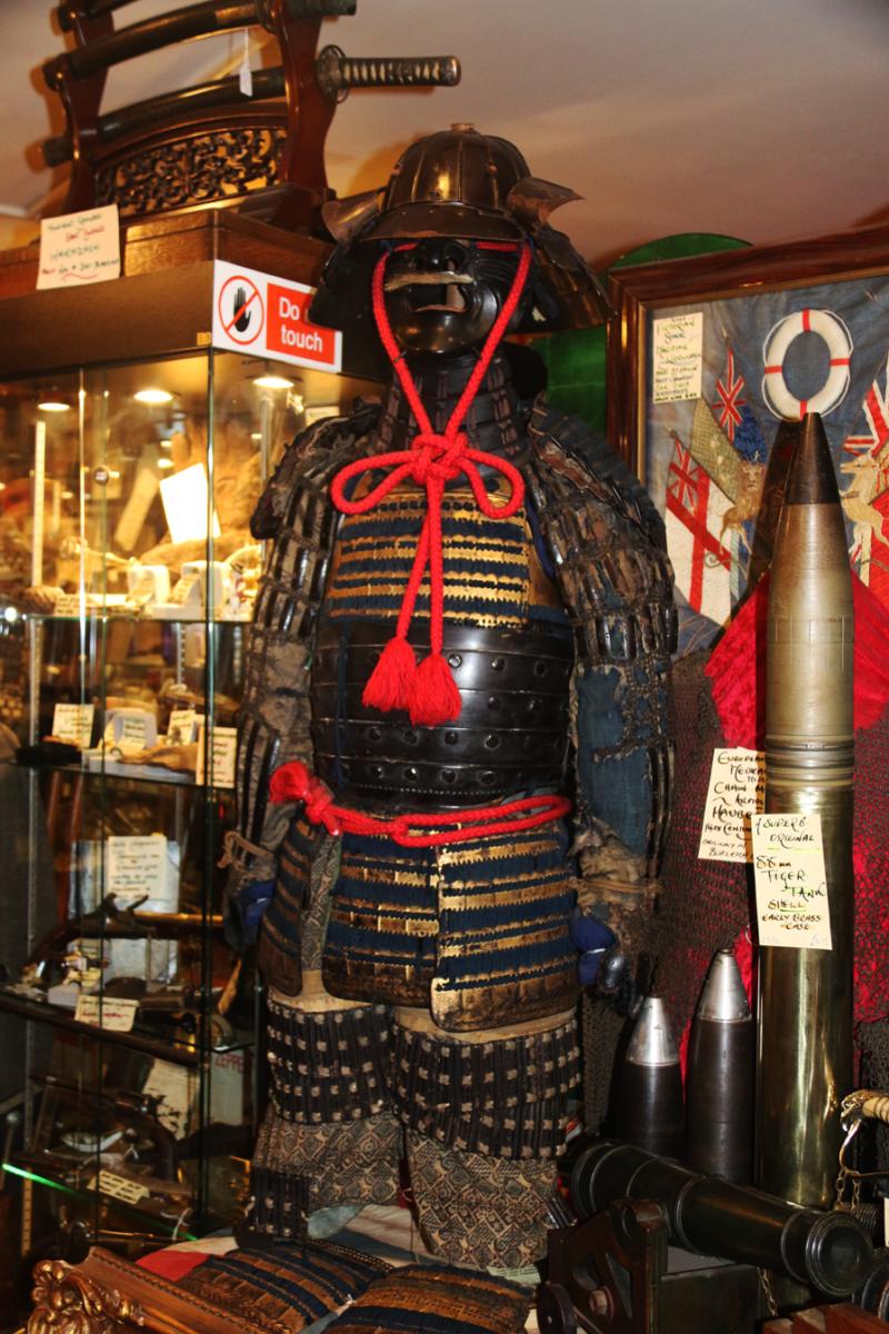 A Beautiful Suit of Edo Samurai Armour in Gold and Black Lacquer With Blue and Black Lacing, Multi Plate Helmet with Dragon Fly Fukegaeshi, With Ressai {Fierce Face} Menpo