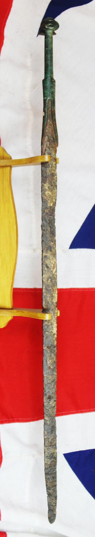 A Wonderful, Museum Piece. A Rare, Ancient Bronze and Iron Incredibly Long, High Status, Combat Cavalry Sword. 36 Inches Long. A Finely Engraved 'Eared' Bronze Hilt With a Long Iron Back Sword Blade. Around 3200 Years Old