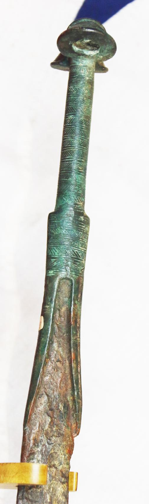 A Wonderful, Museum Piece. A Rare, Ancient Bronze and Iron Incredibly Long, High Status, Combat Cavalry Sword. 36 Inches Long. A Finely Engraved 'Eared' Bronze Hilt With a Long Iron Back Sword Blade. Around 3200 Years Old