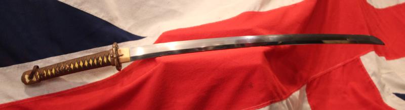 A Superb, Gendaito, Japanese Traditionally Hand Made Officer's Katana By A Famous Gendaito Sword Maker, & Signed Ichihara Ichiryushi Nagamitsu, With His Kakihan, and Silver Clan Kamon Of the Fujii