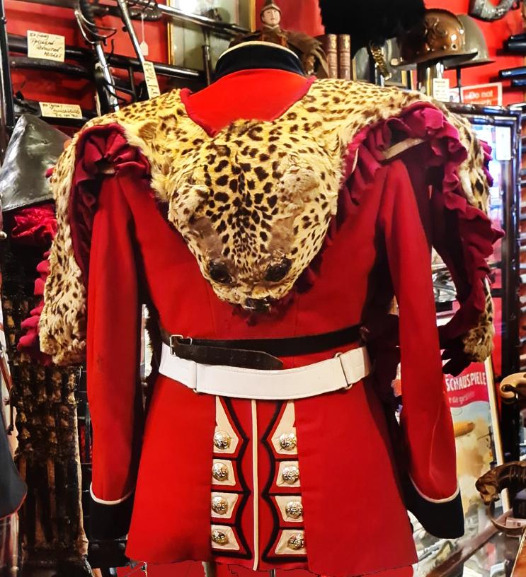 An Original, Victorian, Regimental British Army Leopard Skin Apron & Guards Bandsman’s Tunic for The Ornately Uniformed Regimental Bass Drummer