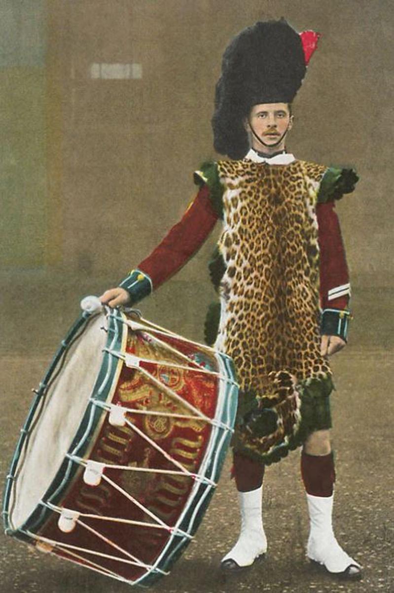 An Original, Victorian, Regimental British Army Leopard Skin Apron & Guards Bandsman’s Tunic for The Ornately Uniformed Regimental Bass Drummer