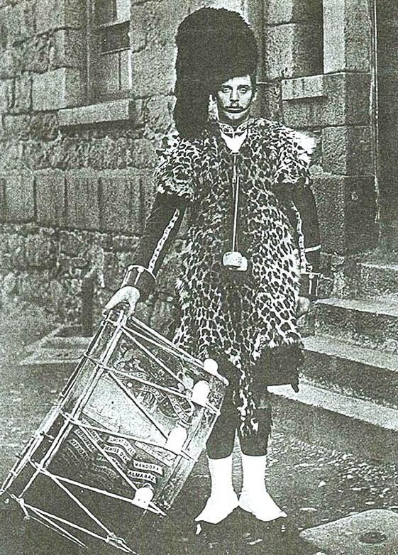 An Original, Victorian, Regimental British Army Leopard Skin Apron & Guards Bandsman’s Tunic for The Ornately Uniformed Regimental Bass Drummer