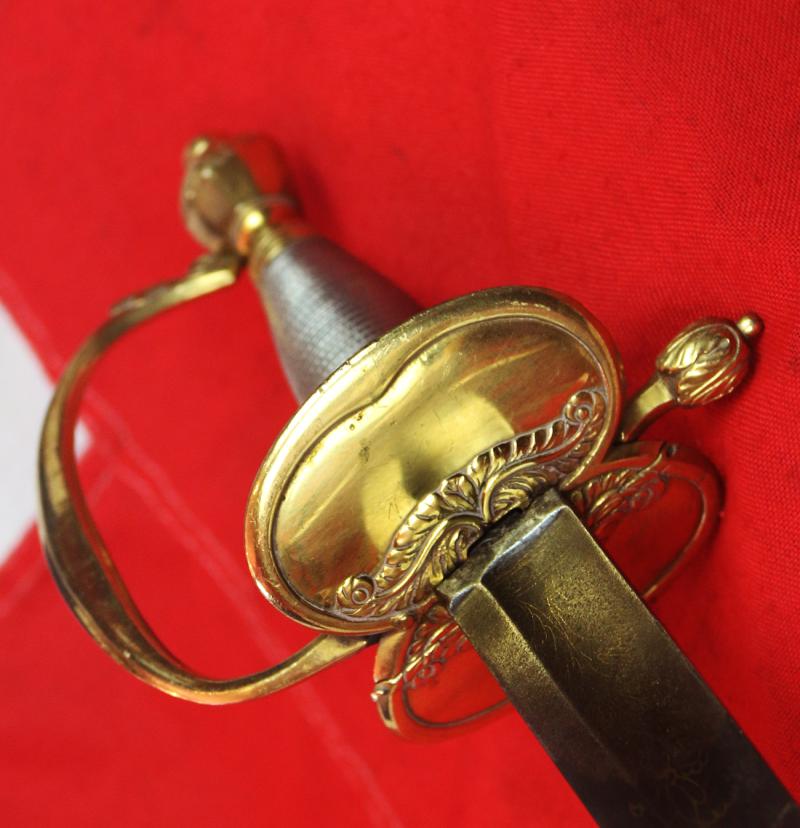 A Very Good 1796 Pattern Infantry Officer's Sword, Beautiful Gilt and Solid Silver Grip. Stunningly Hand Engraved with Royal Crest, Crowned Cyphers And A Standing Infantry Officer Holding His 1796 infantry Sword.