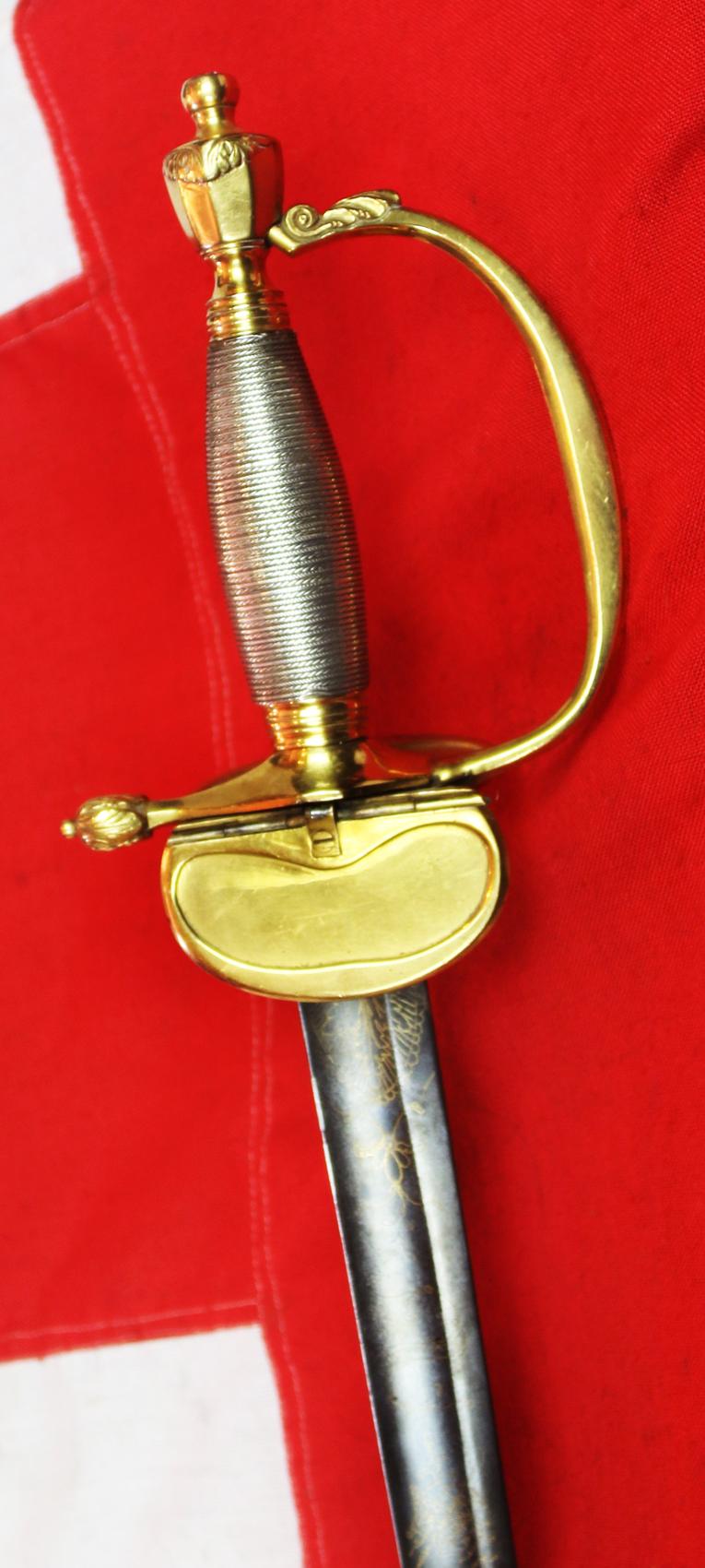 A Very Good 1796 Pattern Infantry Officer's Sword, Beautiful Gilt and Solid Silver Grip. Stunningly Hand Engraved with Royal Crest, Crowned Cyphers And A Standing Infantry Officer Holding His 1796 infantry Sword.