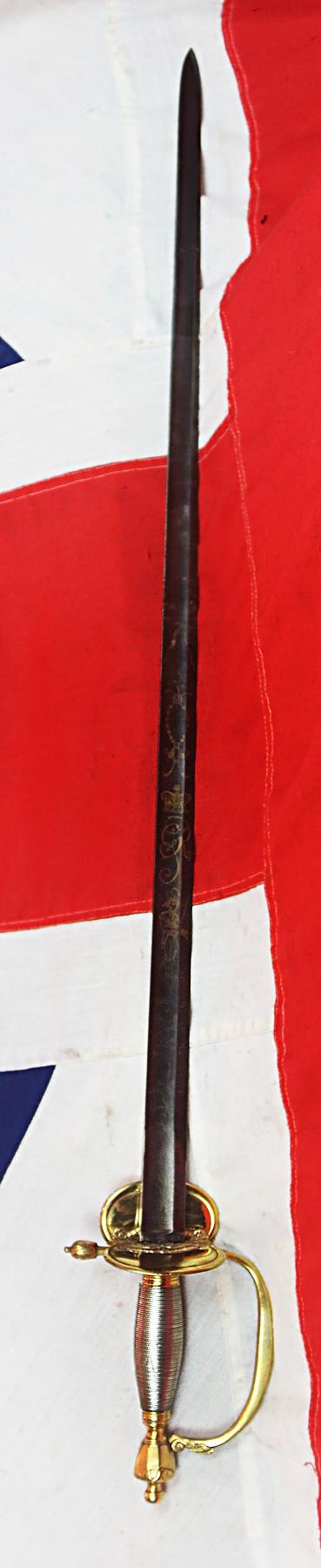 A Very Good 1796 Pattern Infantry Officer's Sword, Beautiful Gilt and Solid Silver Grip. Stunningly Hand Engraved with Royal Crest, Crowned Cyphers And A Standing Infantry Officer Holding His 1796 infantry Sword.