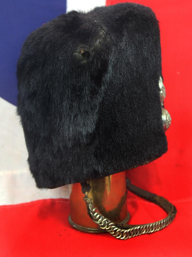 Scarce Antique Victorian Regimental Racoon Skin Cap of The Northumberland Fusiler's. Flaming Fusiler Grenade Badge With George and The Dragon Regimental Motto Quo Fata Vocant With Red and White Feather Hackle, and Curb Chin Chain