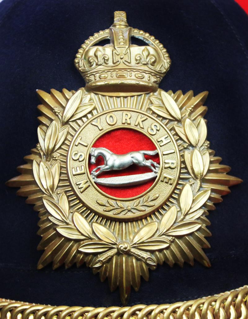 A Superb British, Original, Regimental Edwardian Service Helmet. of The West Yorkshire Regiment. Blue Cloth with Gold Badge, Fittings, Spike, & Rose Head Curb Chain Mounts and Chin Chain