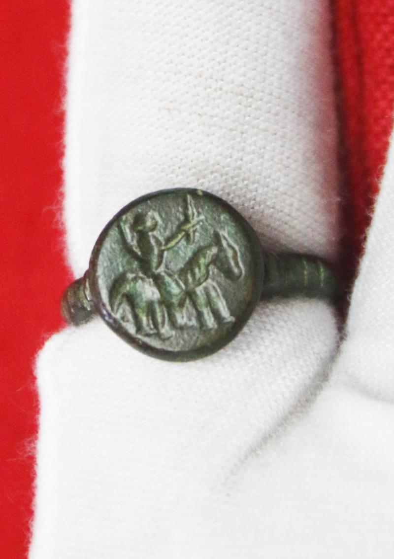 A Fabulous Knight’s Seal Ring, From Agincourt to the Wars of the Roses Period. A 15th Century Ring with an Intaglio Stylized Engraving of An Armoured Knight on Horseback Holding Aloft His Knightly Sword, a Fabulous and Beautiful Piece.